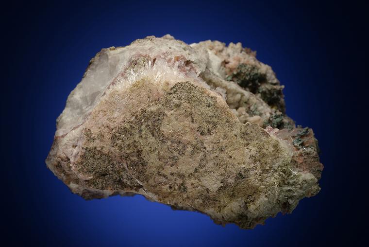 NATROLITE with PREHNITE, ANALCIME and COPPER in CALCITE